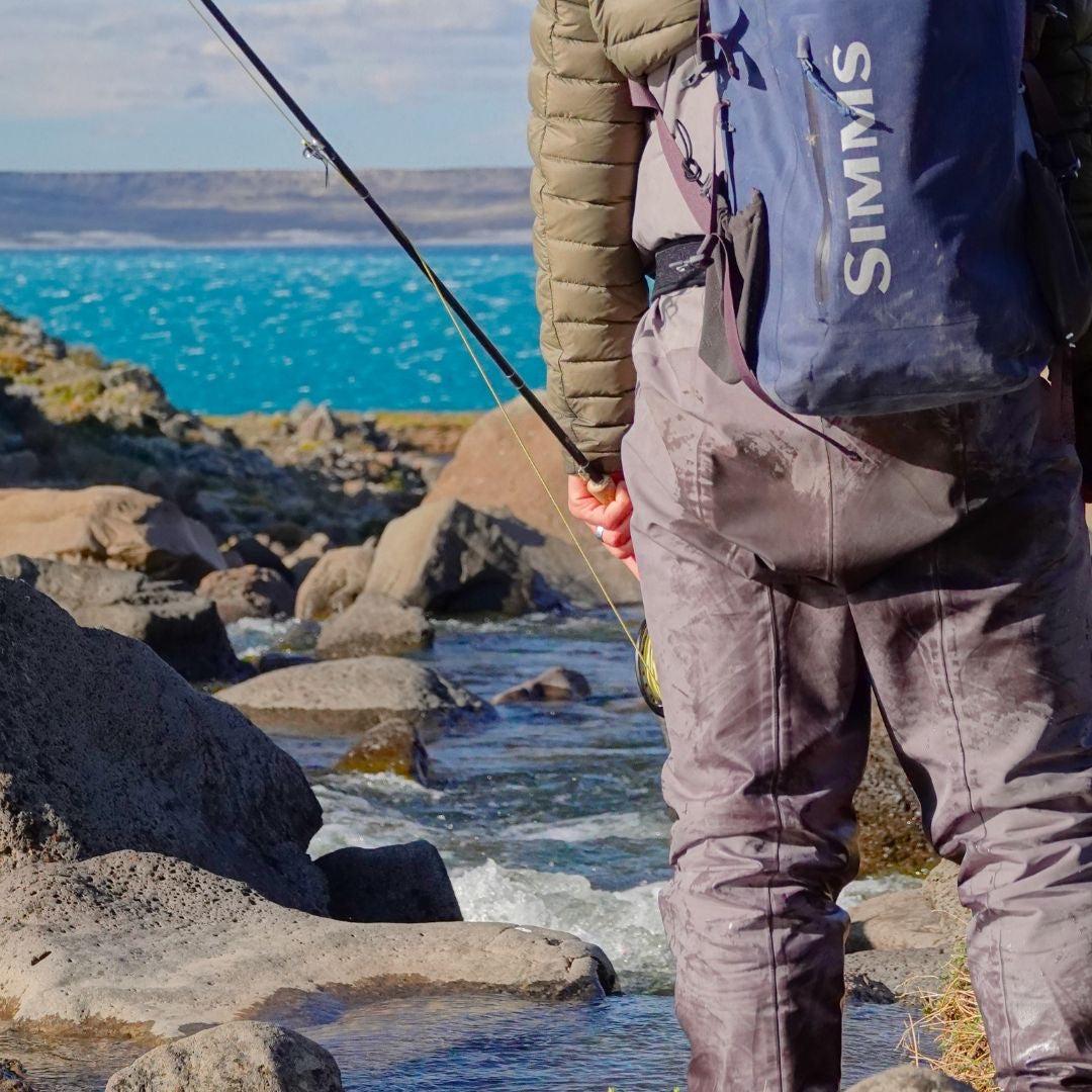 Angler wearing Simms fly-fishing waders on the Barrancoso River in Argentina – Big Sky Anglers